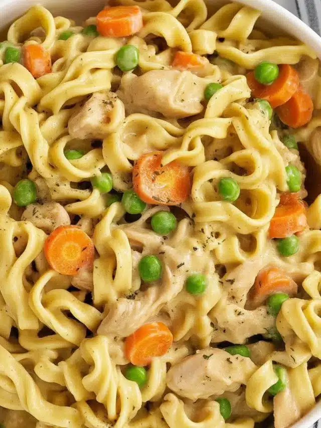 Delicious Chicken Pot Pie Pasta with tender egg noodles and creamy sauce.