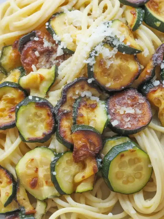 A vibrant dish of zucchini and pasta, featuring garlic, lemon, and Parmesan for added flavor.