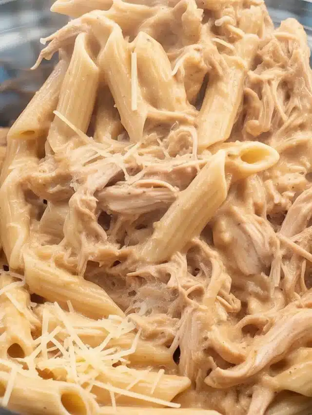 Creamy Marry Me Chicken Pasta made in a crockpot with garlic and sun-dried tomatoes.