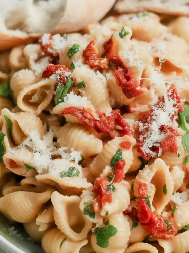 Delicious Pasta With Boursin Cheese topped with roasted tomatoes and herbs.