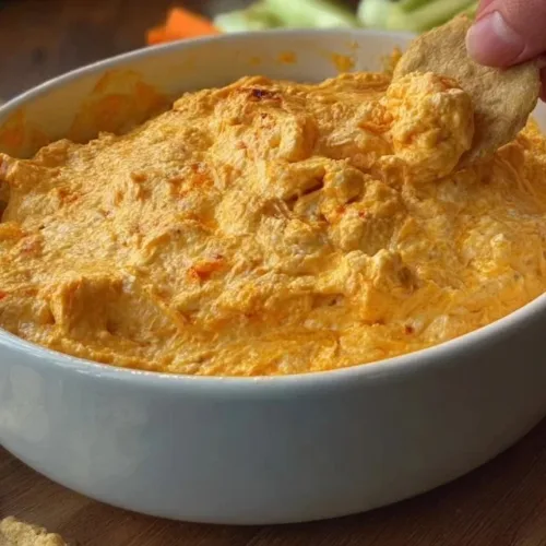 Delicious Buffalo Chicken Dip served in a bowl with tortilla chips