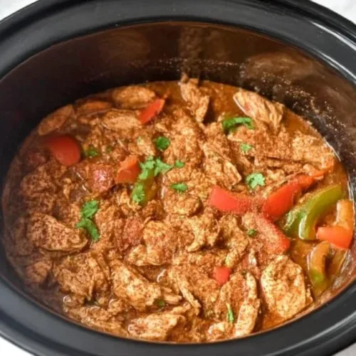 Slow-cooker chicken fajitas with vibrant peppers and onions
