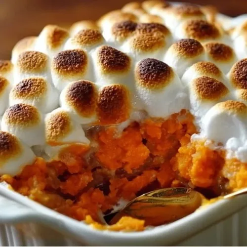 Delicious sweet potato casserole topped with toasted marshmallows