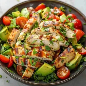 Healthy avocado chicken salad with fresh ingredients and vibrant colors