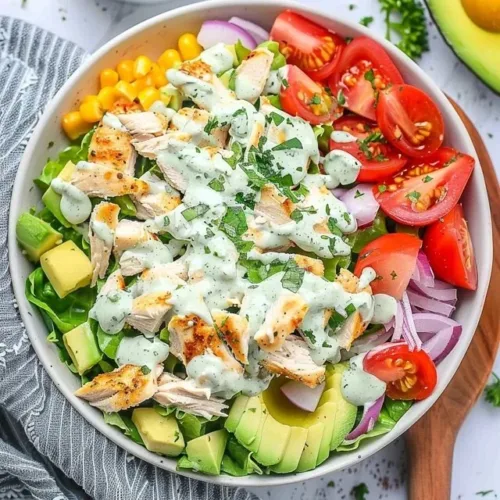 Healthy ranch chicken salad with fresh vegetables and grilled chicken