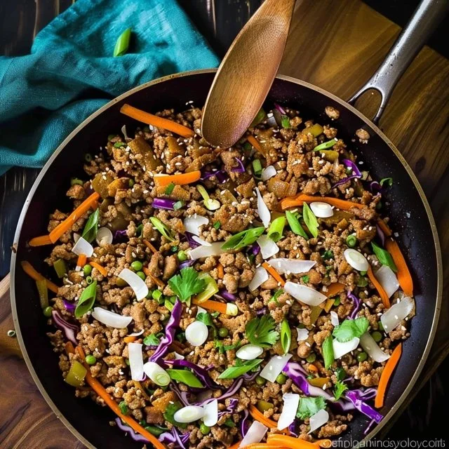 Asian Garlic Sesame Chicken Egg Roll Bowls with vibrant vegetables and sesame seeds