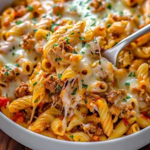 One-skillet cheesy ground chicken pasta served in a bowl