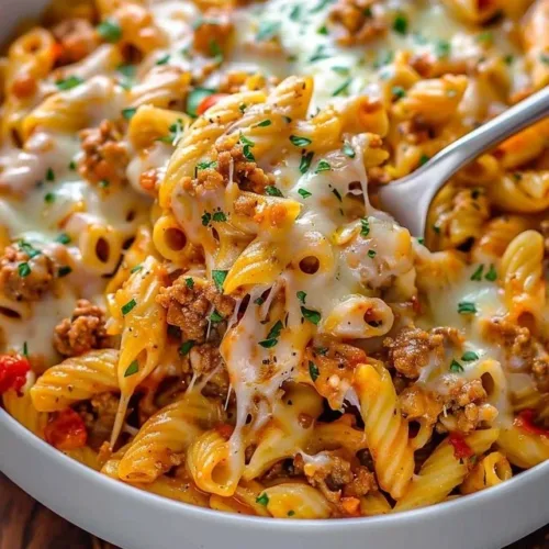 One-skillet cheesy ground chicken pasta served in a bowl