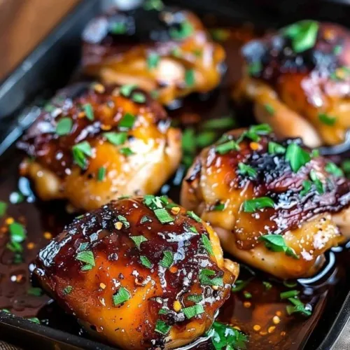 Delicious Honey Garlic Boneless Chicken Thighs served on a plate