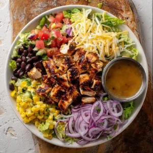 Healthy BBQ chicken salad with fresh vegetables and grilled chicken