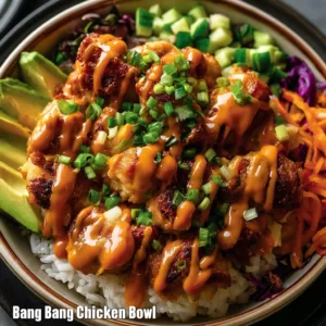 Bang Bang Chicken Bowl with vibrant ingredients and spicy sauce