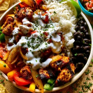 Delicious Chicken Fajita Rice Bowl with vibrant peppers and rice