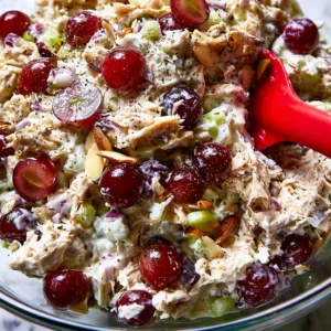 Delicious classic chicken salad served in a bowl with fresh ingredients