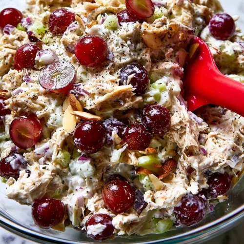 Delicious classic chicken salad served in a bowl with fresh ingredients